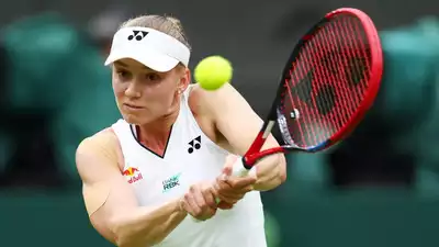 Wimbledon: Elena Rybakina overcomes early nerves to get title defence started