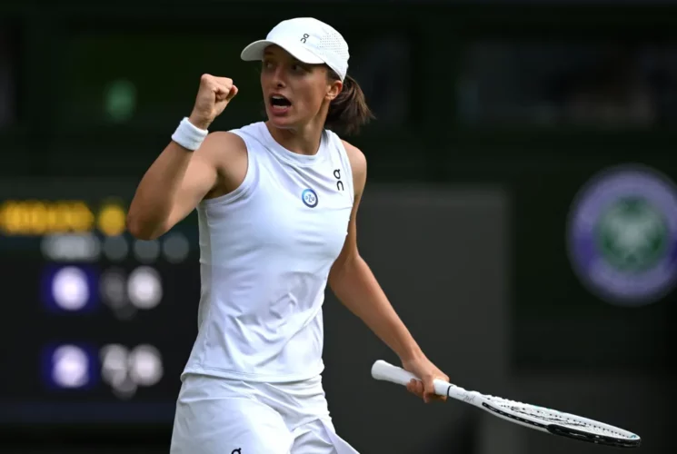 Swiatek saves match points to beat Bencic; into first Wimbledon quarterfinal