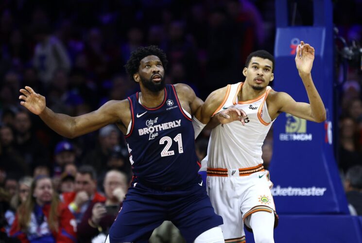 Joel Embiid breaks Wilt Chamberlain’s 76ers record with a scorching 70-point performance.