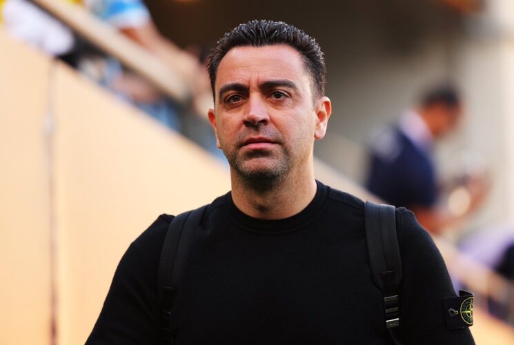 Xavi reverses decision, commits future to Barcelona