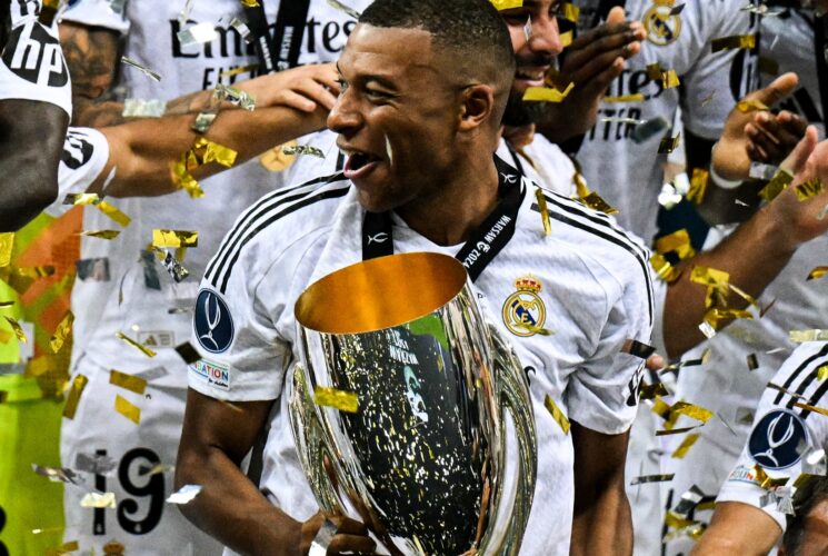 Mbappe records perfect debut as he wins first UEFA trophy