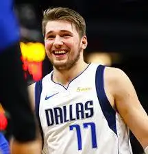 Luka Doncic Sidelined: Mavericks Star Guard Out with Calf Contusion.