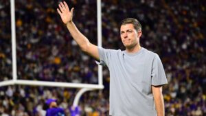 Neal Skupski cheering the crowd in LSU