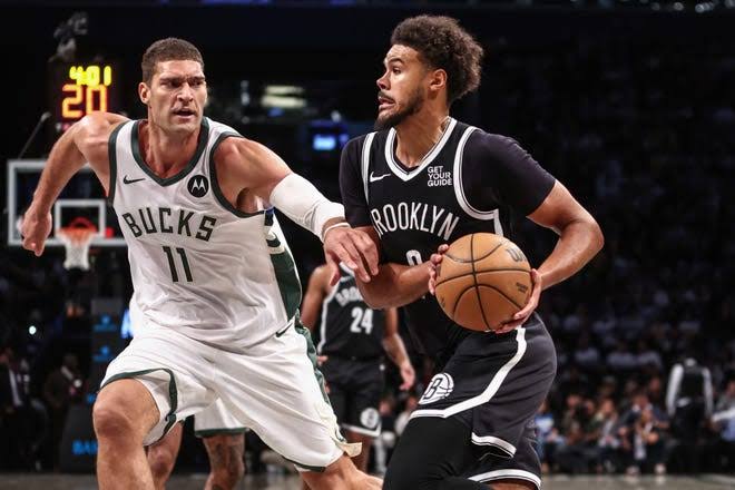 Nets Defeat Bucks in High-Scoring Affair