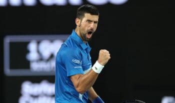 MELBOURNE, AUSTRALIA – JANUARY 13: Novak Djokovic of Serbia celebrates a point against Nishesh Basavareddy of the United States in the Men’s Singles First Round match during day two of the 2025 Australian Open at Melbourne Park on January 13, 2025 in Melbourne, Australia. (Photo by Cameron Spencer/Getty Images)