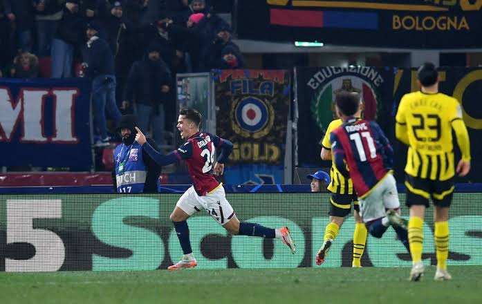 Dortmund crumble to Bologna as hosts earn first win